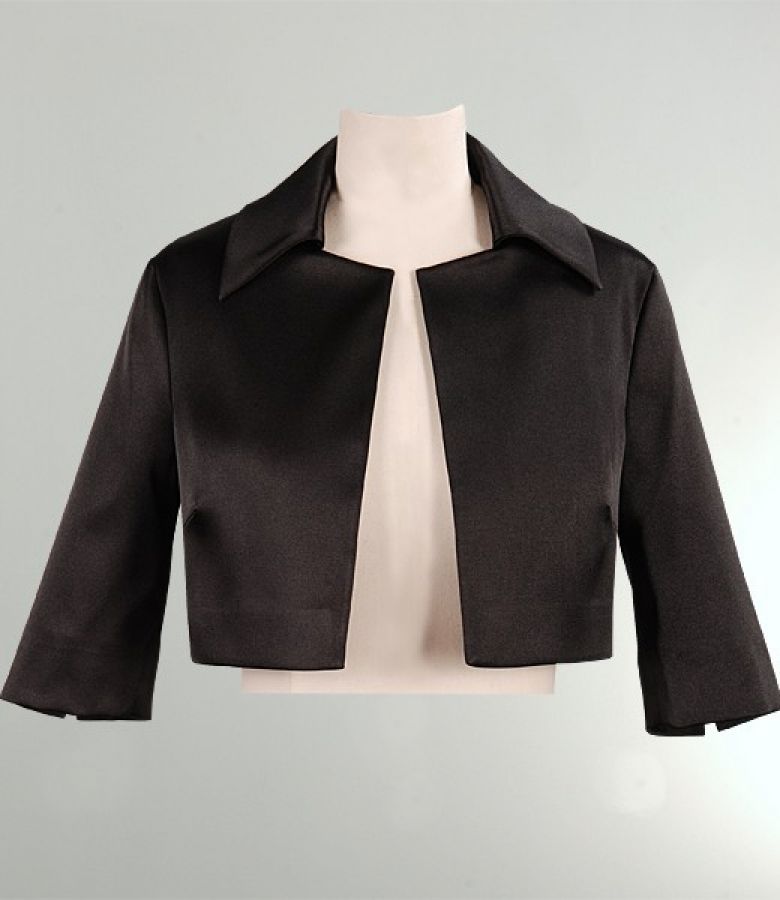 Black bolero of elastic satined fabric