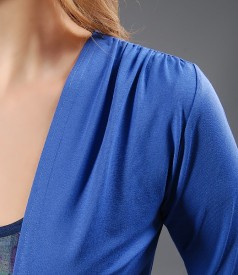 Blue jersey blouse tied with belt