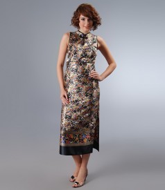 Long dress in print satin with decorative clasp