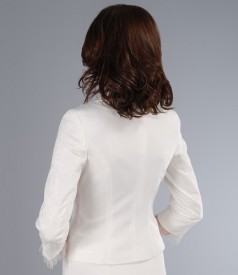 Elegant jacket garnished with brocard and tulle