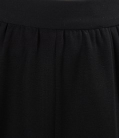 Skirt with gussets in black fabric