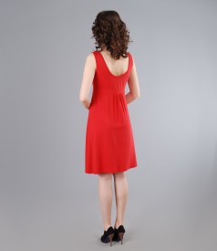 Jersey dress with cord and folds