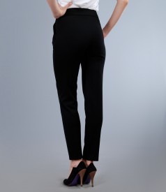 Black elastic fabric trousers with pockets