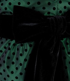 Green taffeta dress with dots and velvet cord
