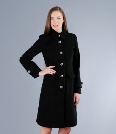 Black coat with applied pockets