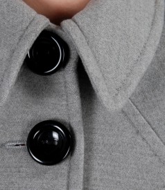 Grey coat with applied pockets