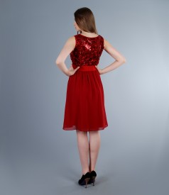 Dress with sequins and floral paterns bodice