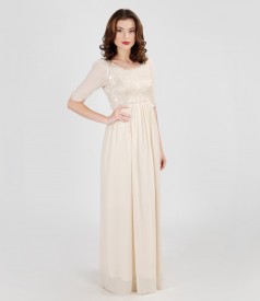 Long evening dress from elastic brocade and veil