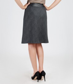 Flaring skirt with leather trim