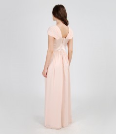 Long evening dress from veil and satin with crystals trim
