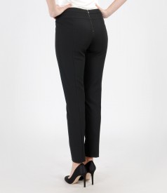 Elastic fabric trousers with metallic zipper