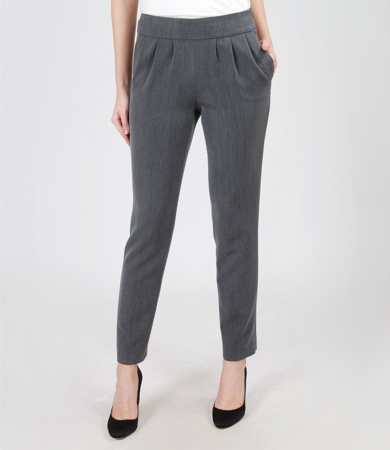 Elastic fabric trousers with pockets