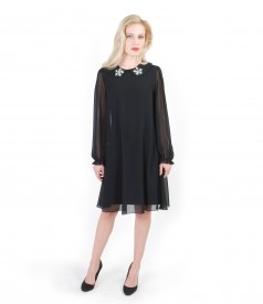 Evening veil dress with puffed sleeves and trim