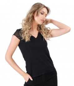 Elastic jersey blouse with trim and veil fins