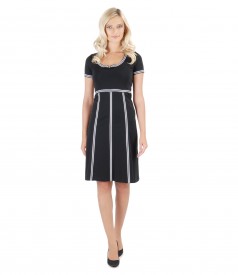 Elastic knit dress with trim