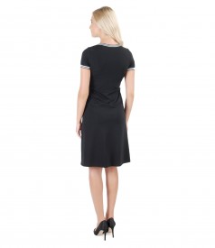 Elastic knit dress with trim