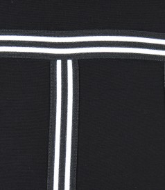 Elastic knit dress with trim