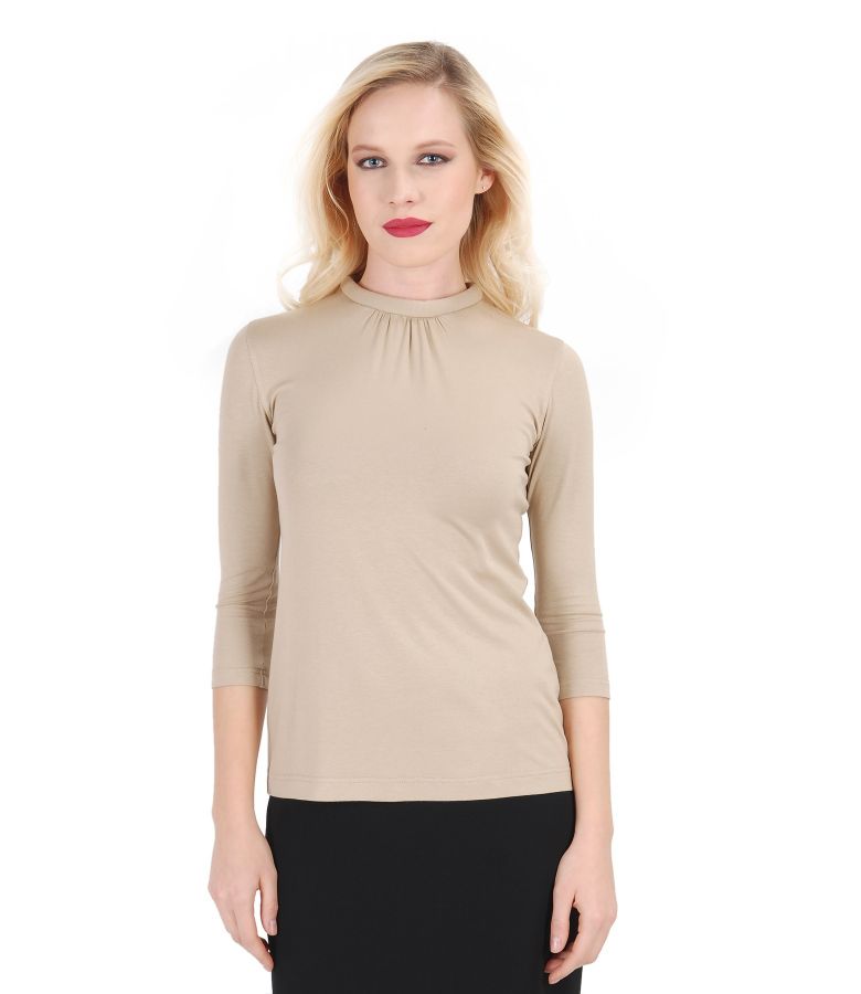 Elastic jerse blouse with folds