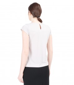 Jersey blouse with folds and trim