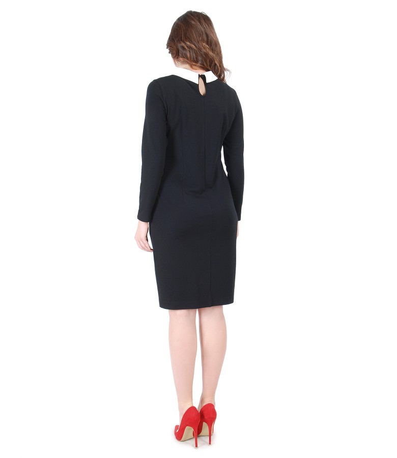 Elegant outfit with elastic knitwear dress and crystal brooch