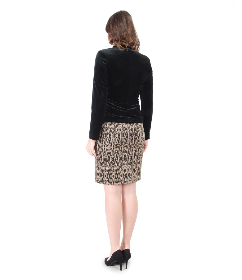 Elegant outfit with dress with golden motifs and velvet jacket