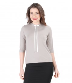 Elegant blouse with bow on decolletage