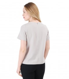 Elegant blouse with front pockets