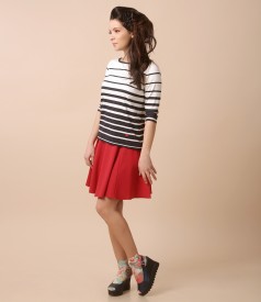 Casual outfit with flaring skirt and jersey blouse with stripes