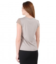 Elastic jersey blouse with trim and veil fins