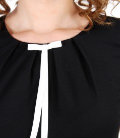 Elastic jersey blouse with bow on decolletage