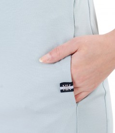 Elastic jersey dress with side pockets