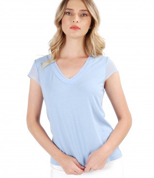 Elastic jersey blouse with trim and veil fins