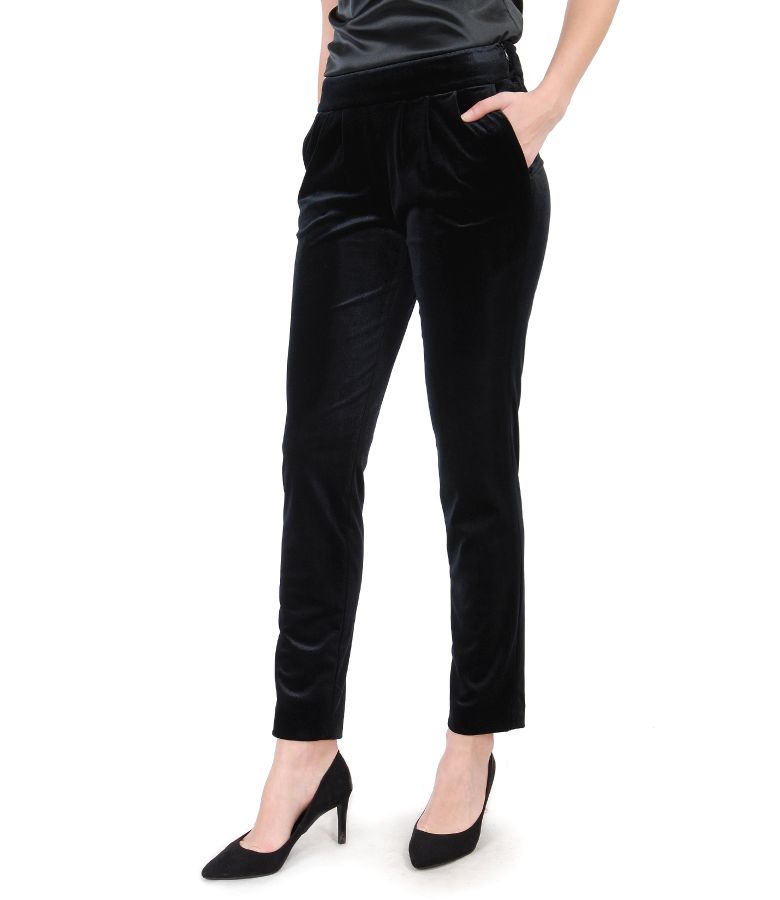 Elastic velvet trousers with pockets