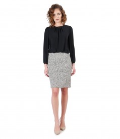 Office outfit with loop skirt and blouse with folds on decolletage