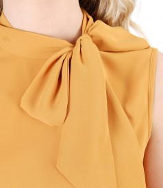 Blouse without sleeves and scarf collar