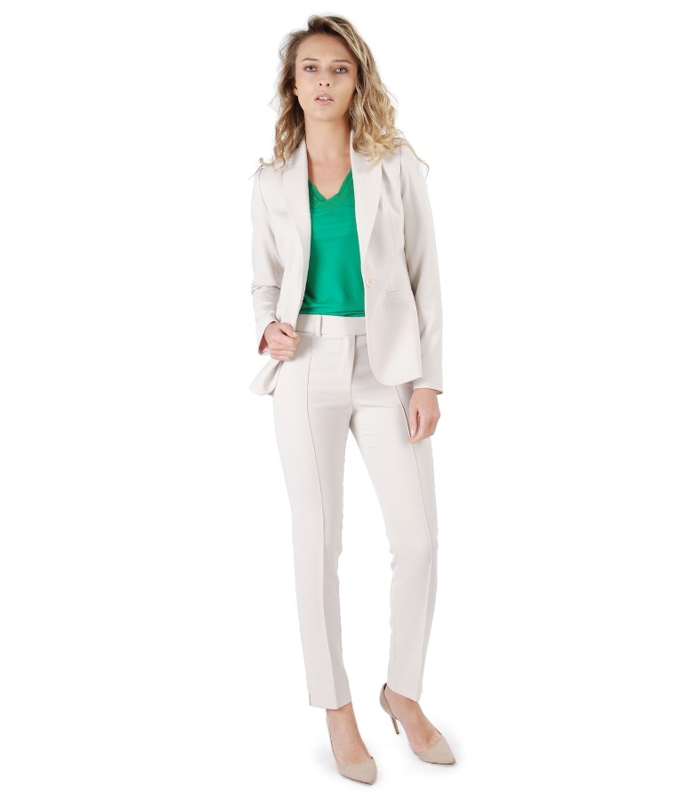 Office women suit with jacket and ankle plants made of beige elastic fabric