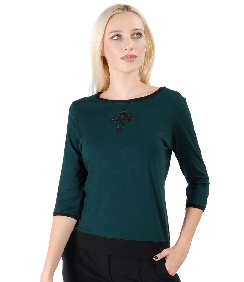 Elastic jersey blouse with front ornament