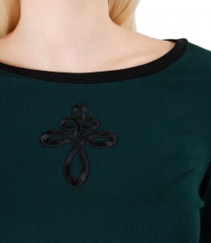 Elastic jersey blouse with front ornament