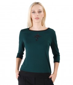 Elastic jersey blouse with front ornament