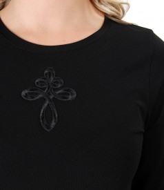 Elastic jersey blouse with front ornament