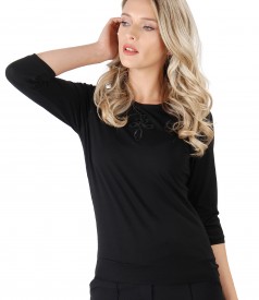 Elastic jersey blouse with front ornament