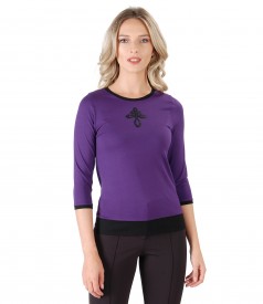 Elastic jersey blouse with front ornament