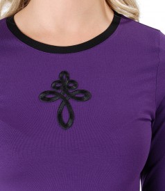 Elastic jersey blouse with front ornament