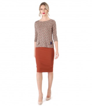 Office outfit with tapered skirt and jerse blouse with decorative flaps