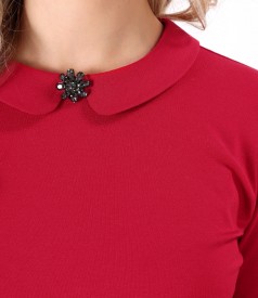 Elastic jersey blouse with round collar with brooch