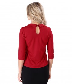 Elastic jersey blouse with round collar with brooch