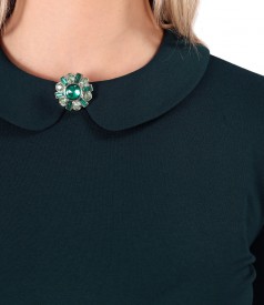 Elastic jersey blouse with round collar with brooch