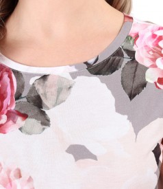 Elastic jersey blouse printed with floral motifs