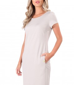 Elastic jersey dress with side pockets