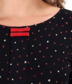 Elastic jersey blouse with rips bow at the neckline